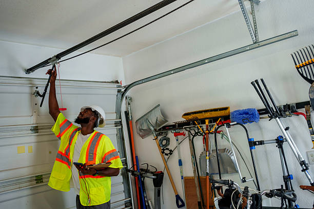 Professional Garage Door Panel Replacement technician working in Alpena, MI